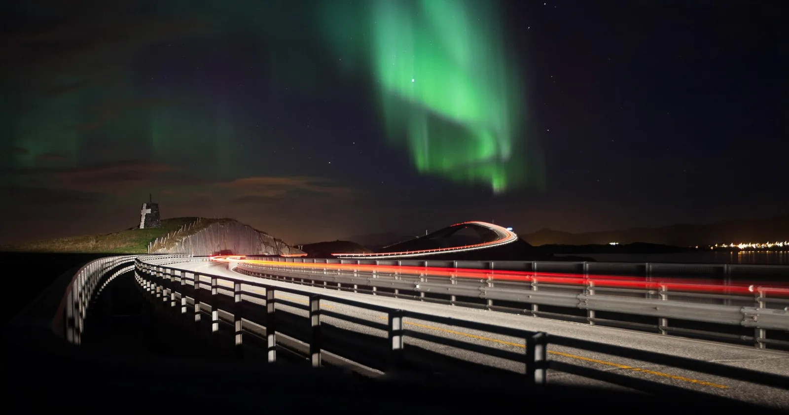 Northern lights over the Atlanterhavsvegen road in Møre og Romsdal