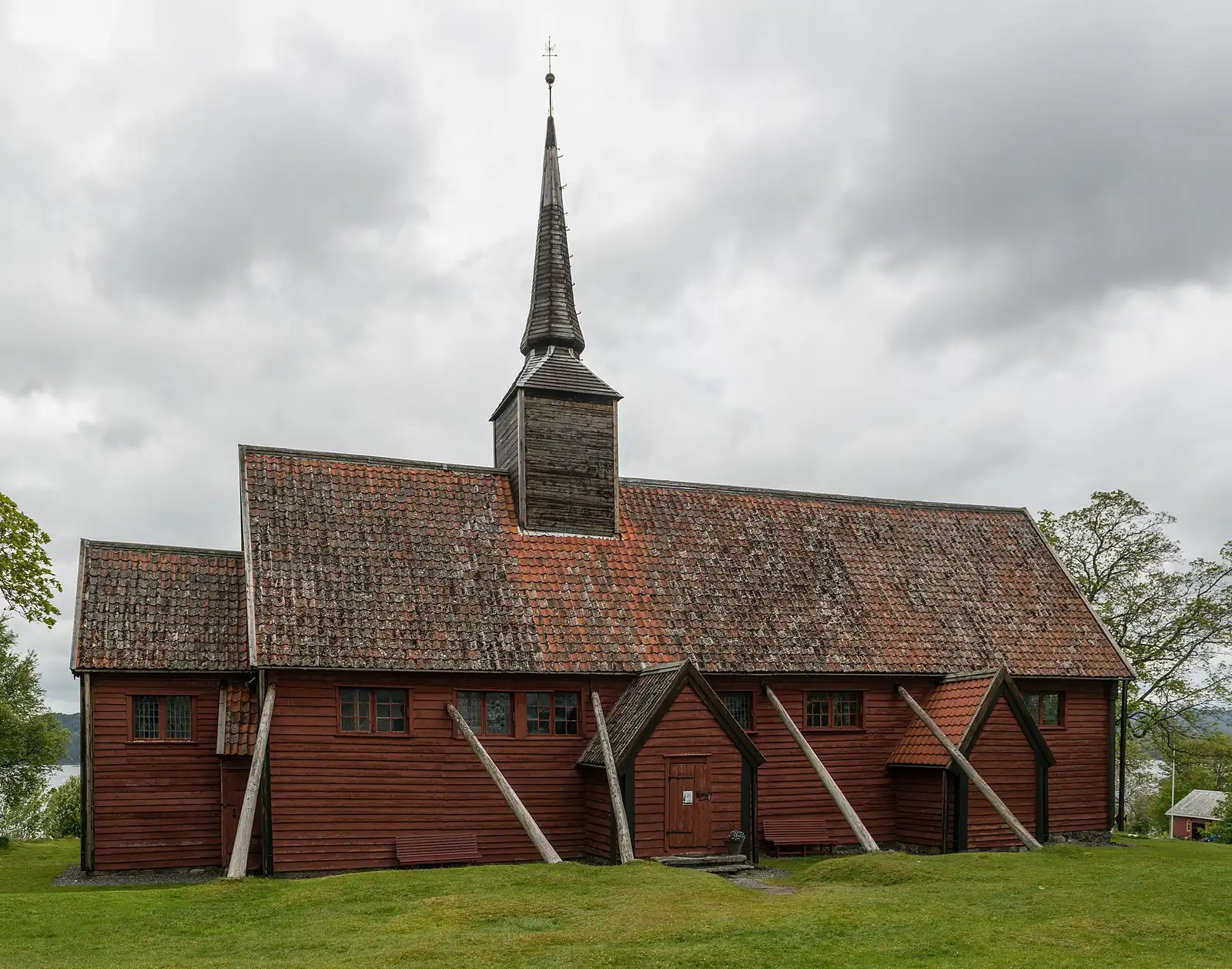 Kvernes stave church, a red wooden church on Averøy island, Norway